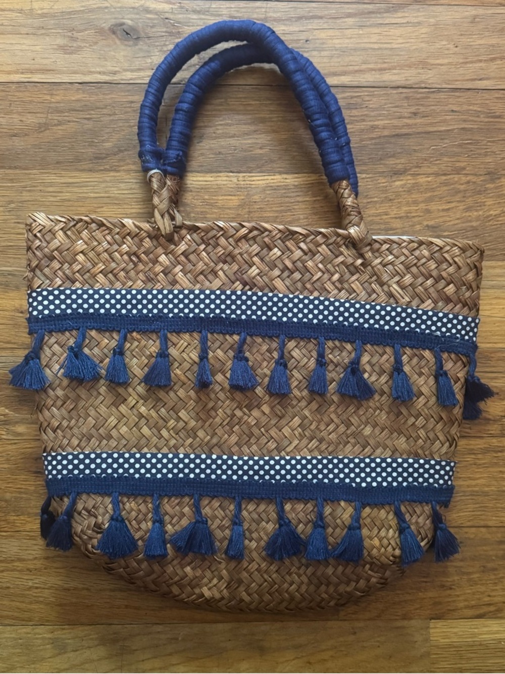 Straw Tote Bag with Navy Tassel and polka dot Trim. Measurement in picture.